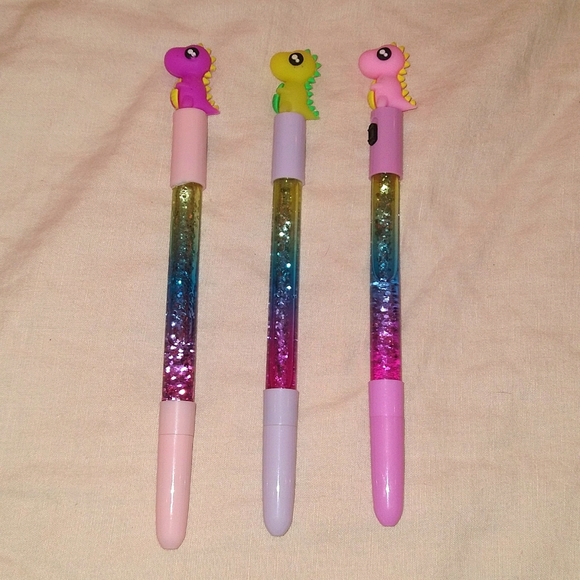 LED Light Up Dinosaur Pen with Rainbow Glitter Gel - Picture 3 of 3